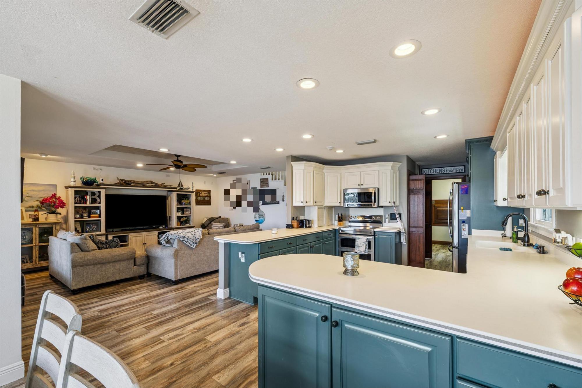 7121 Wells Avenue Navarre, FL 32566 - Photo 37 of 125 a kitchen with a sink appliances and cabinets