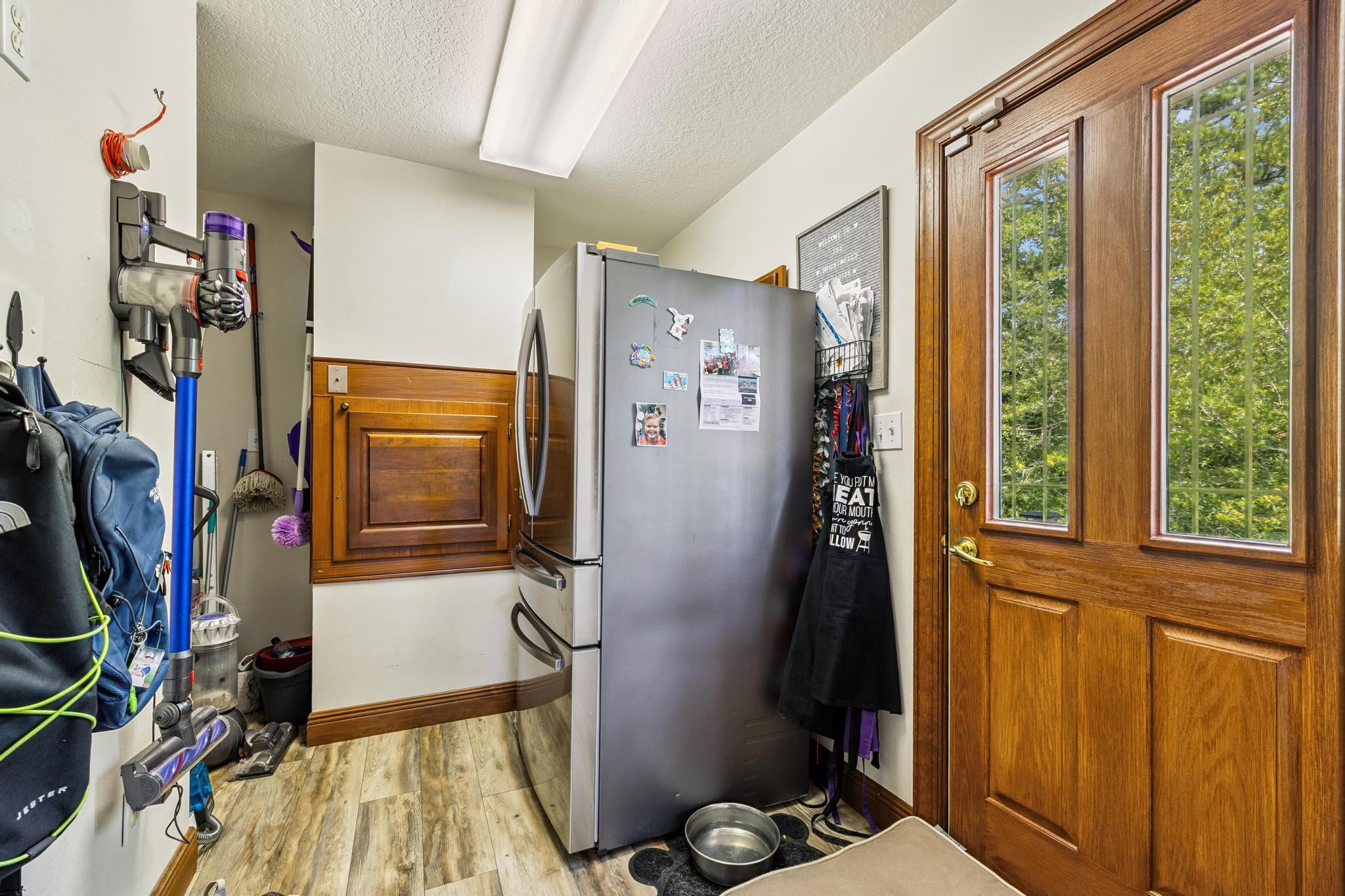 7121 Wells Avenue Navarre, FL 32566 - Photo 46 of 125 a view of walk in closet with clothes and shoes
