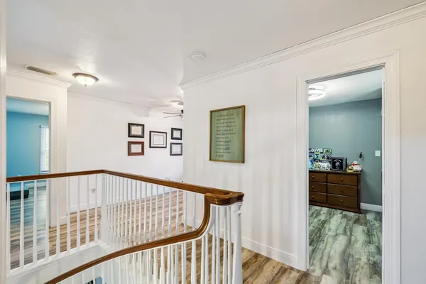 a view of a balcony with furniture