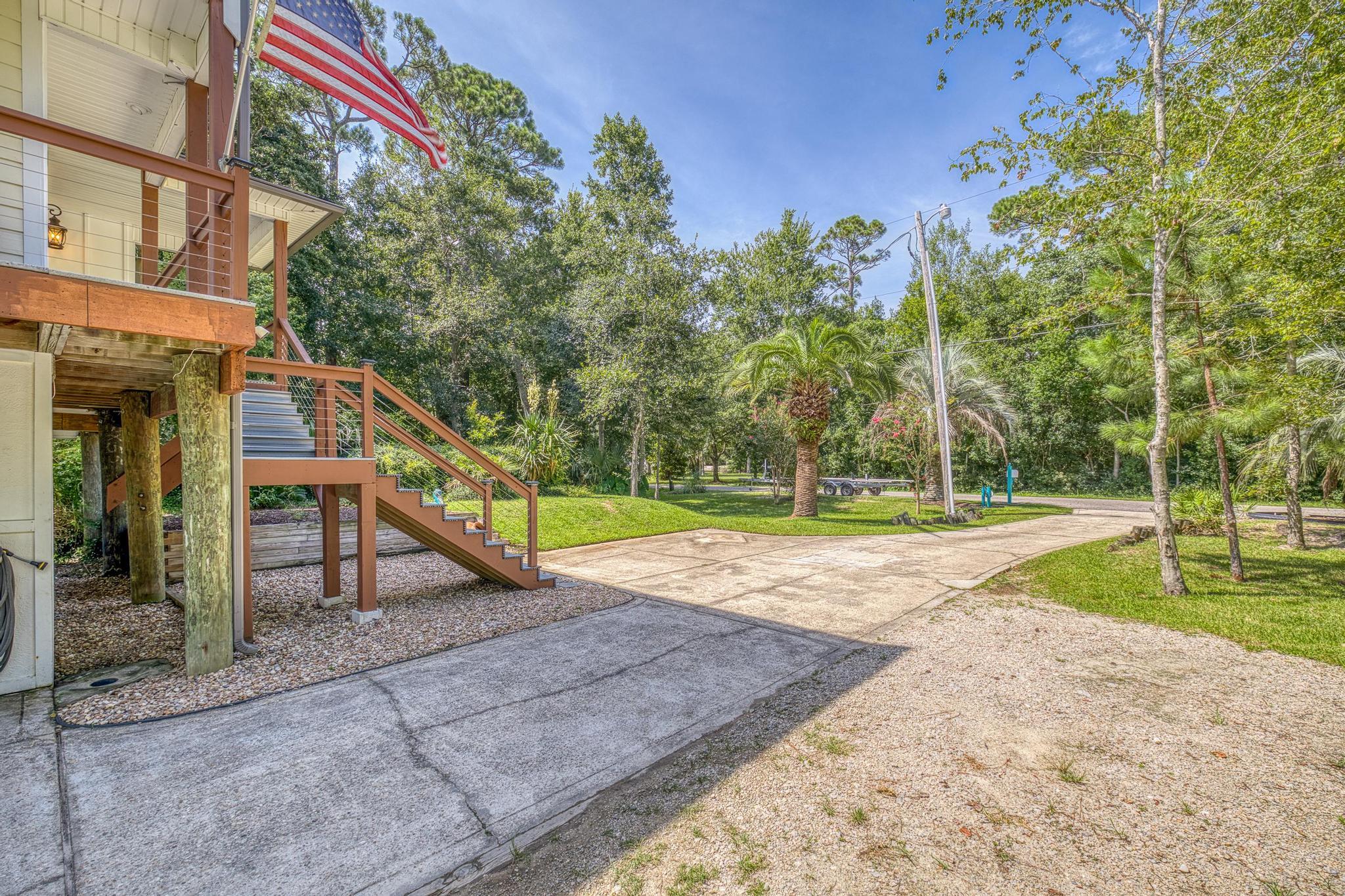 7121 Wells Avenue Navarre, FL 32566 - Photo 61 of 125 a view of a park with swings on the wall