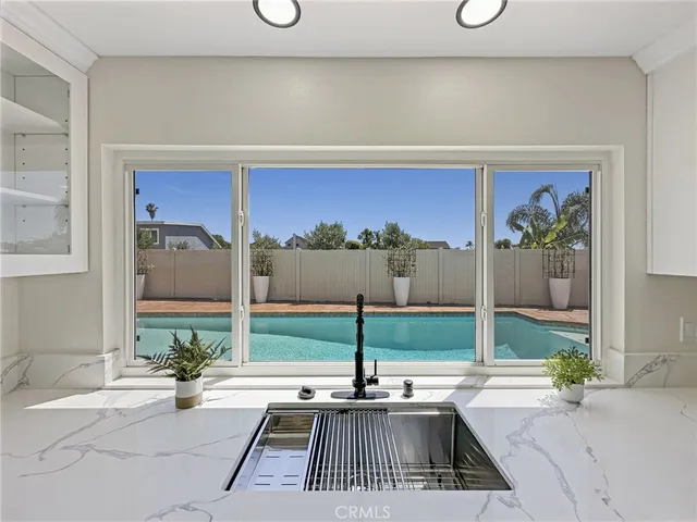 a view of a living room and front door