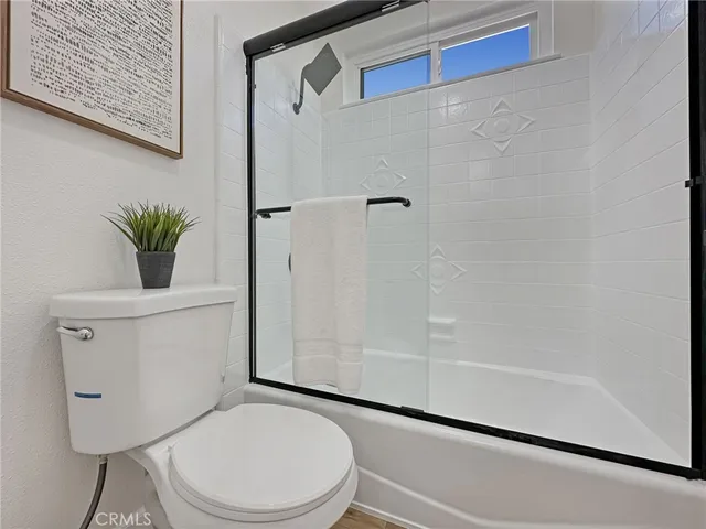 a view of kitchen with wooden floor