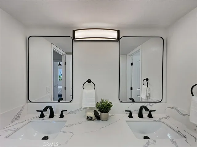 a bathroom with a shower and toilet