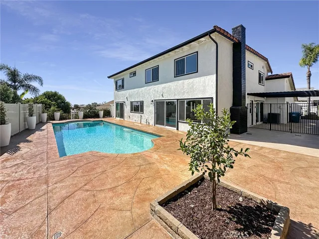 a view of a lake with a house in the background