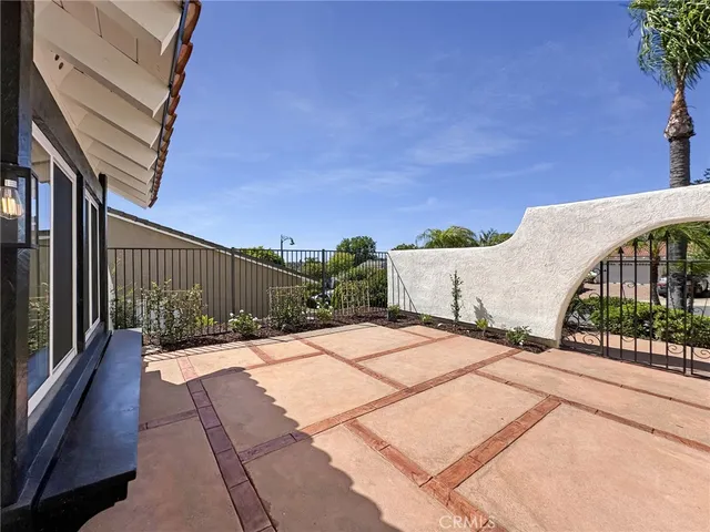 a backyard of a house with wooden floor