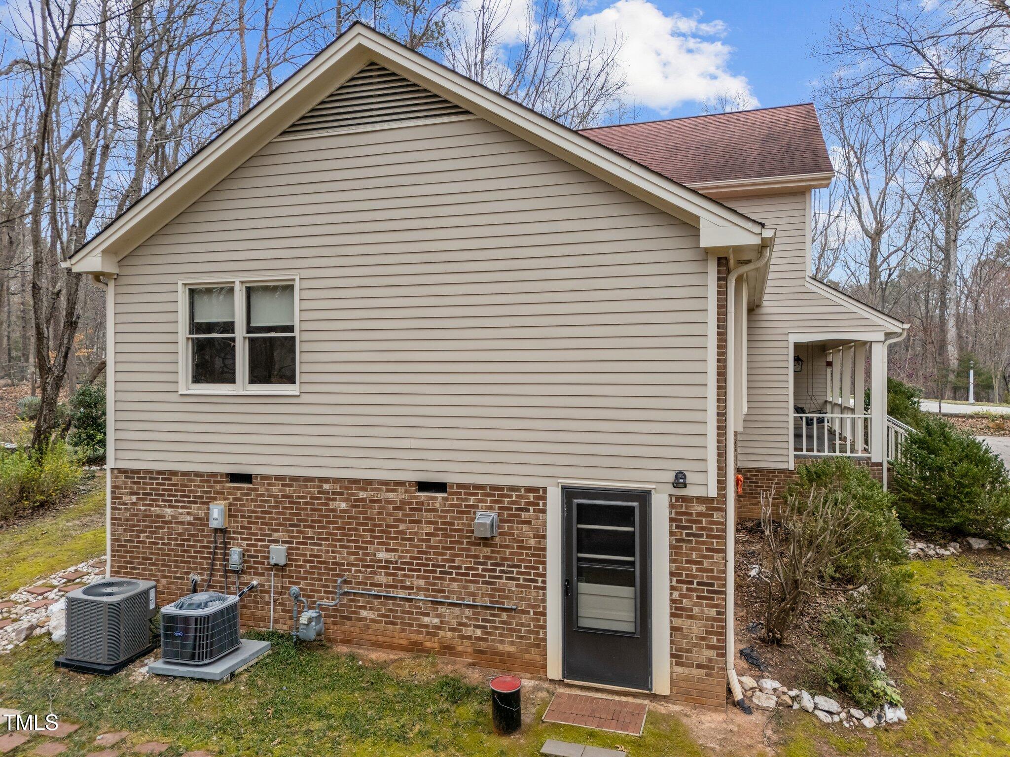 5012 Springwood Drive Raleigh, NC 27613 - Photo 35 of 44 Workshop Entry