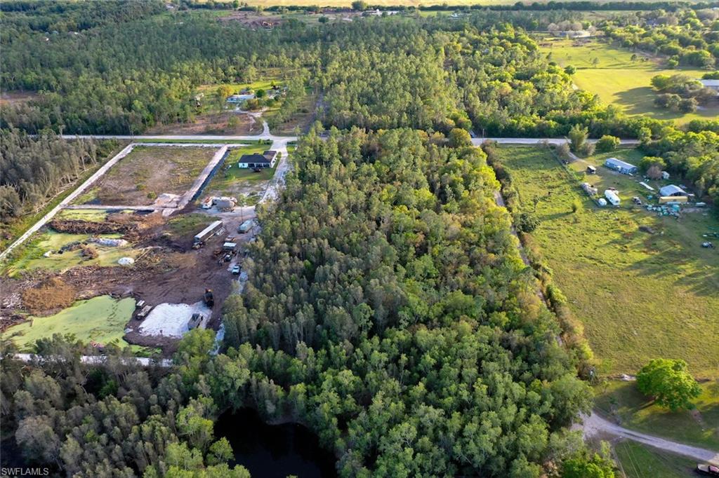 0 Platt Road Naples, FL 34120 - Photo 4 of 16 View of property location featuring a forest