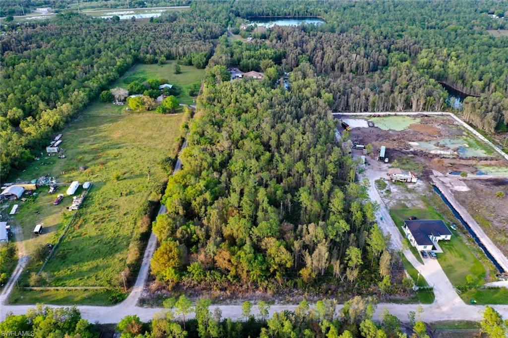 0 Platt Road Naples, FL 34120 - Photo 7 of 16 View of property location with a forest