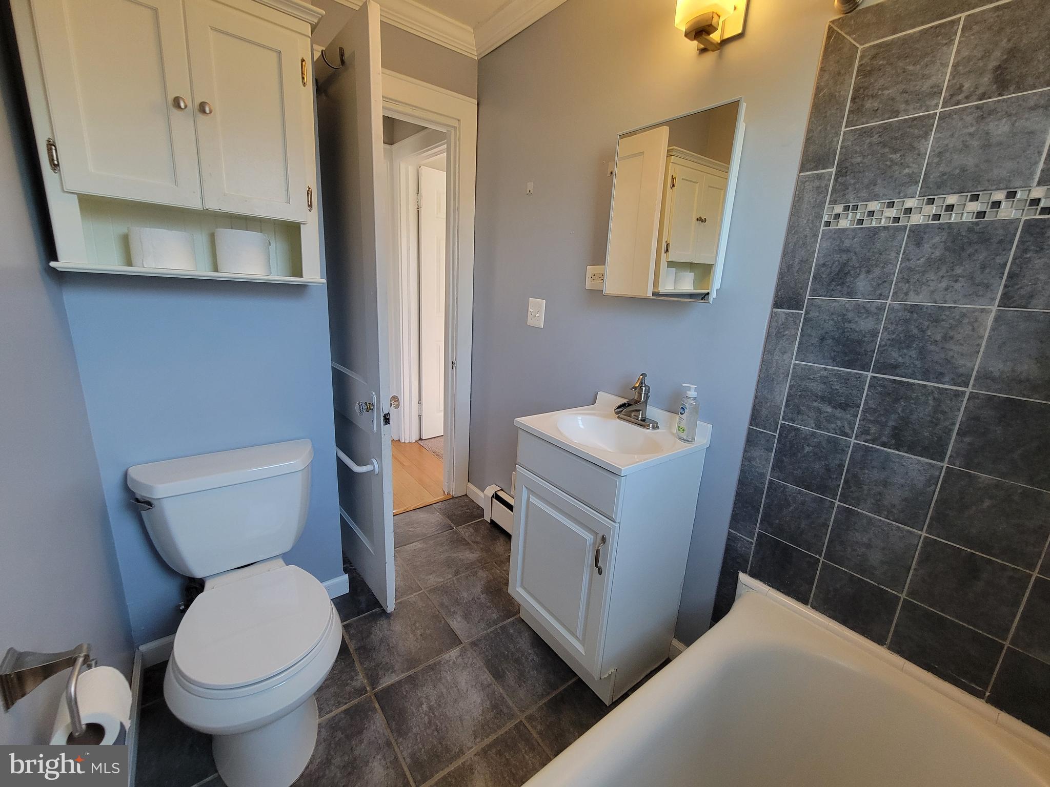 11 Zieglers Lane Hamilton, NJ 08690 - Photo 12 of 20 a bathroom with a toilet and a sink