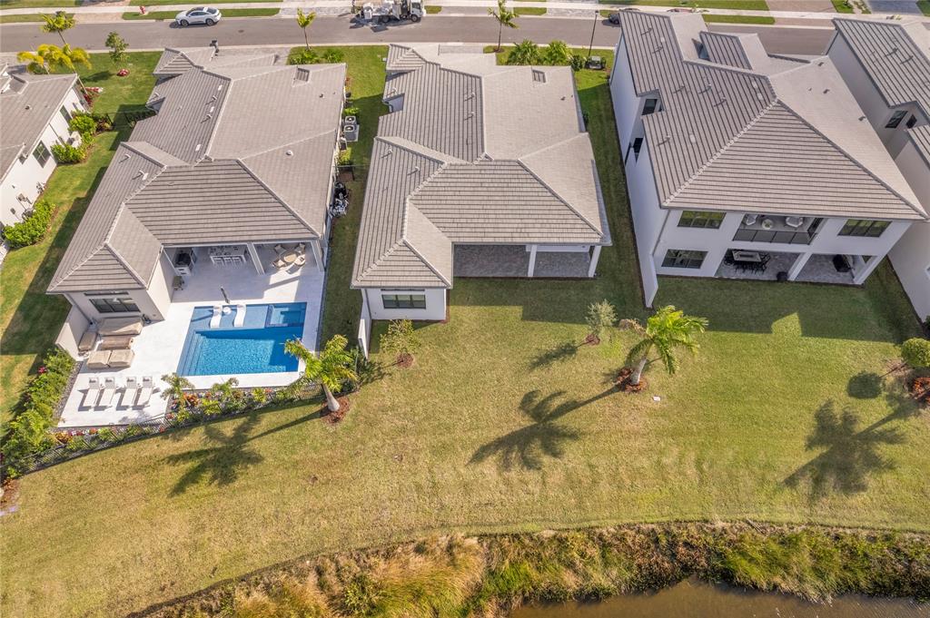 20041 Pacific Dunes Drive Boca Raton, FL 33434 - Photo 40 of 64 an aerial view of a house with swimming pool