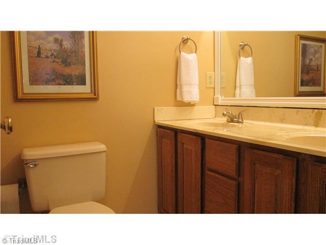 8021 Linville Road Oak Ridge, NC 27310 - Photo 12 of 16 Master Bath/Spa. Double sinks in the master bath