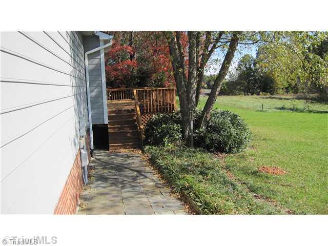8021 Linville Road Oak Ridge, NC 27310 - Photo 15 of 16 Exterior Back.