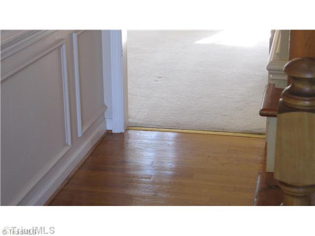8021 Linville Road Oak Ridge, NC 27310 - Photo 3 of 16 Entry. Harwoods in entry way