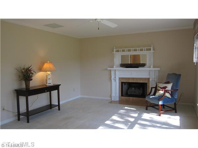 8021 Linville Road Oak Ridge, NC 27310 - Photo 4 of 16 Living Room. Spacious Family room that over looks beautiful level backyard.