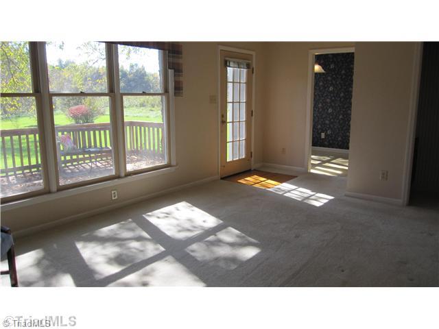8021 Linville Road Oak Ridge, NC 27310 - Photo 5 of 16 Living Room. Living Room just off Eat in kitchen