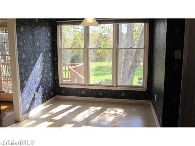 8021 Linville Road Oak Ridge, NC 27310 - Photo 7 of 16 Kitchen. Eat in Kitchen Space that overlooks the beautiful backyard