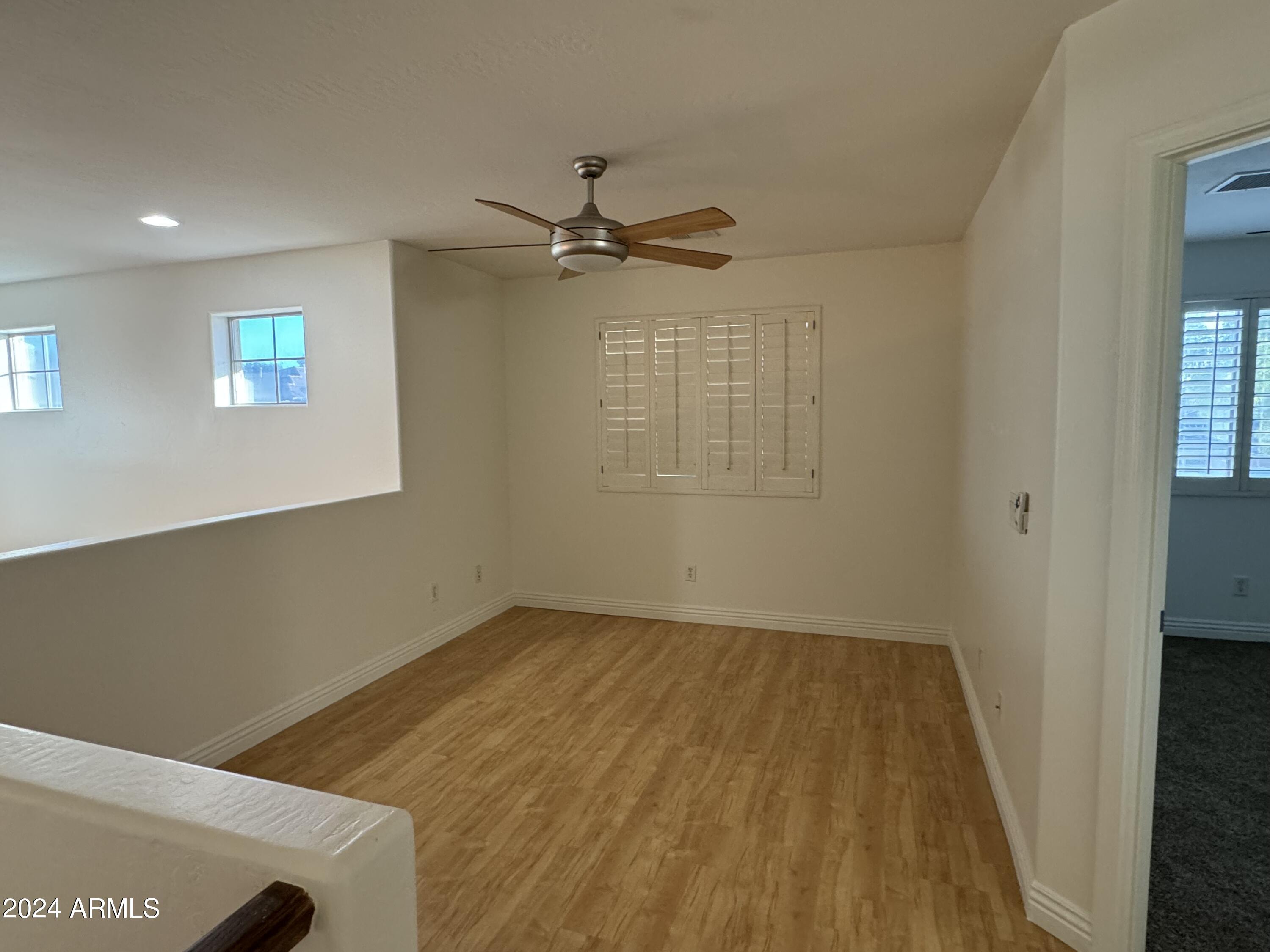 4576 East Sundance Avenue Gilbert, AZ 85297 - Photo 20 of 23 a view of an empty room with a window
