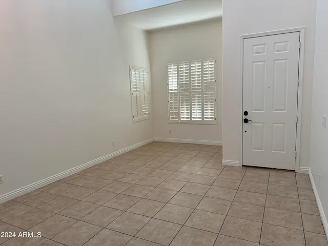 a view of an empty room with window