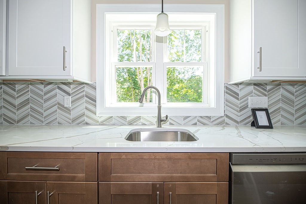 10 Meadowview Lane, Unit B Salisbury, MA 01952 - Photo 7 of 31 a kitchen with a sink and a window