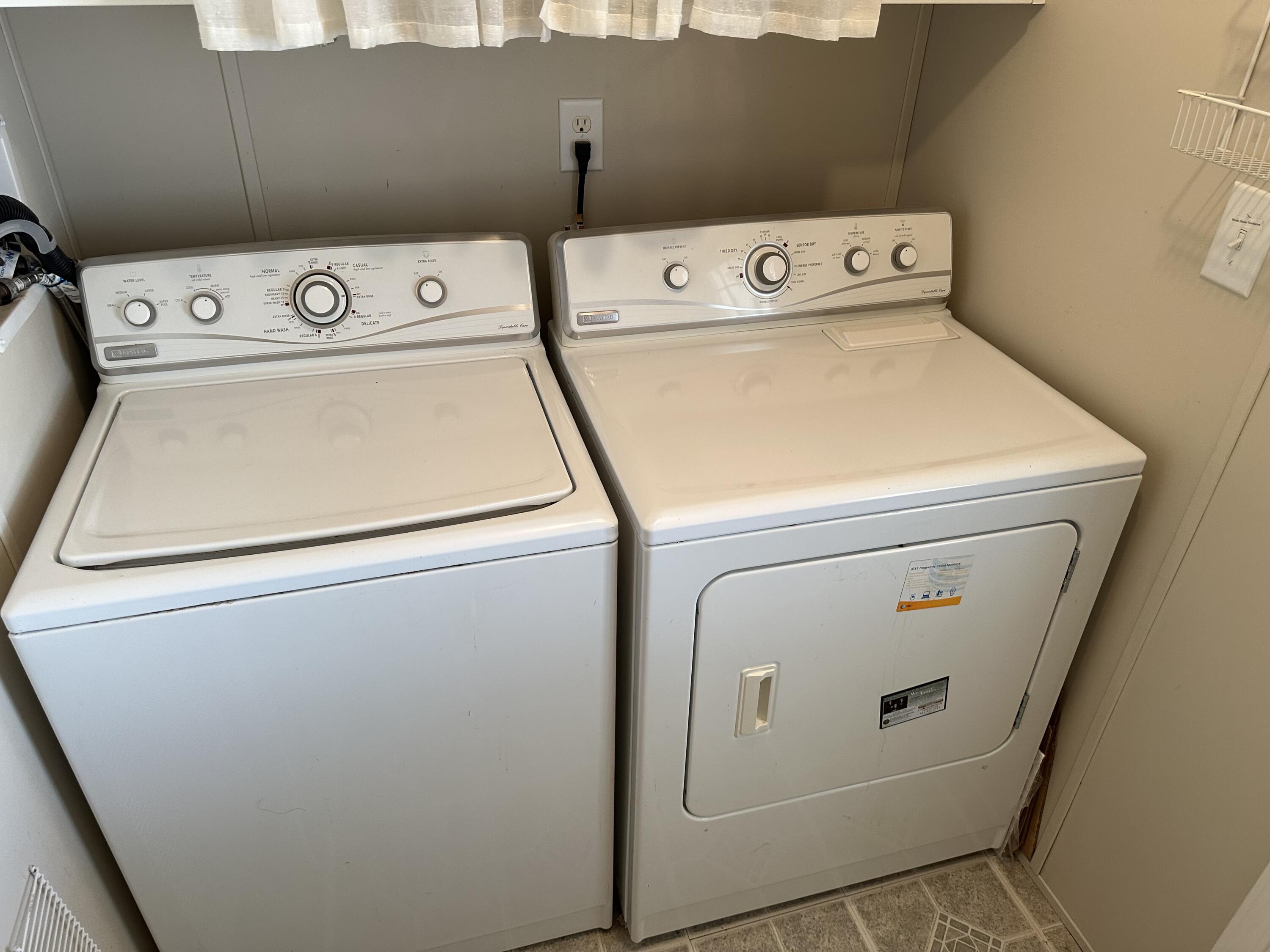 14567 Sunset Drive Delray Beach, FL 33445 - Photo 27 of 32 a utility room with dryer and washer
