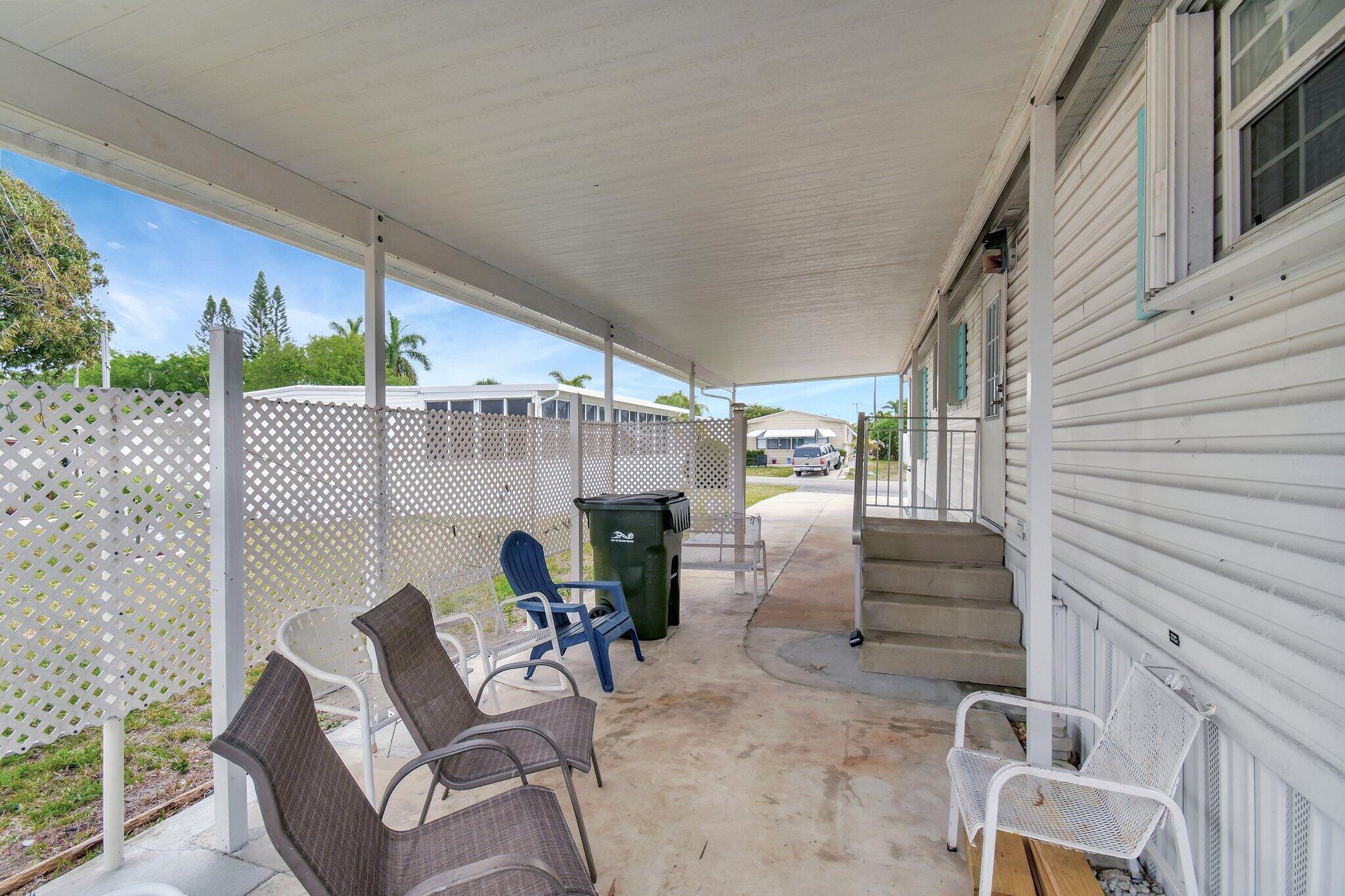 14567 Sunset Drive Delray Beach, FL 33445 - Photo 3 of 32 a view of outdoor seating area with furniture