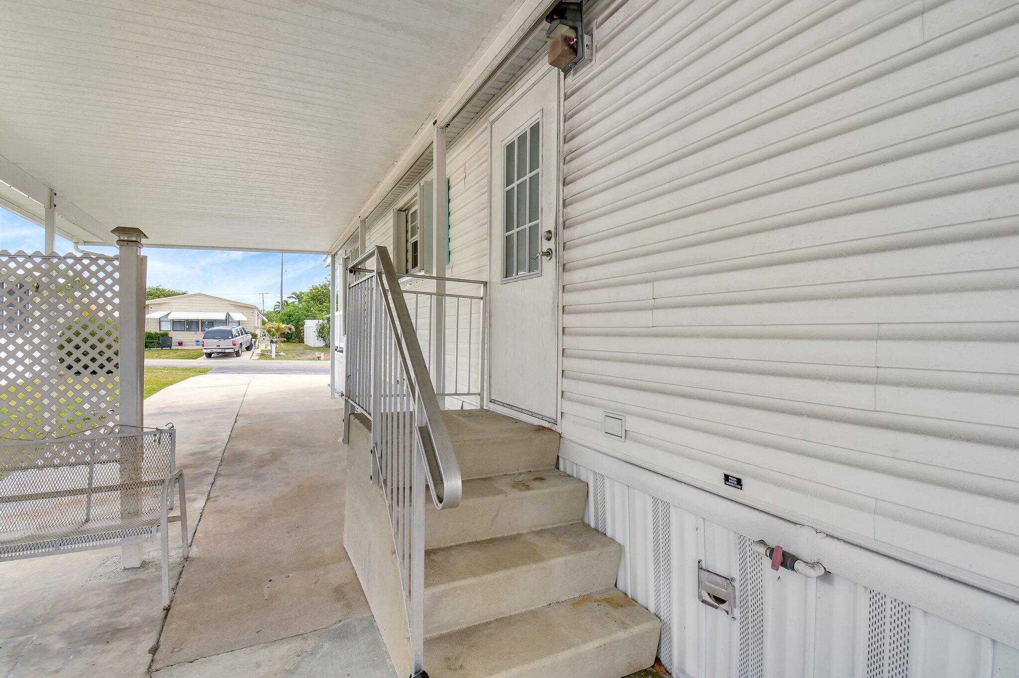 14567 Sunset Drive Delray Beach, FL 33445 - Photo 4 of 32 a view of entryway and hall