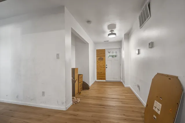 a view of livingroom with hardwood floor and a ceiling fan