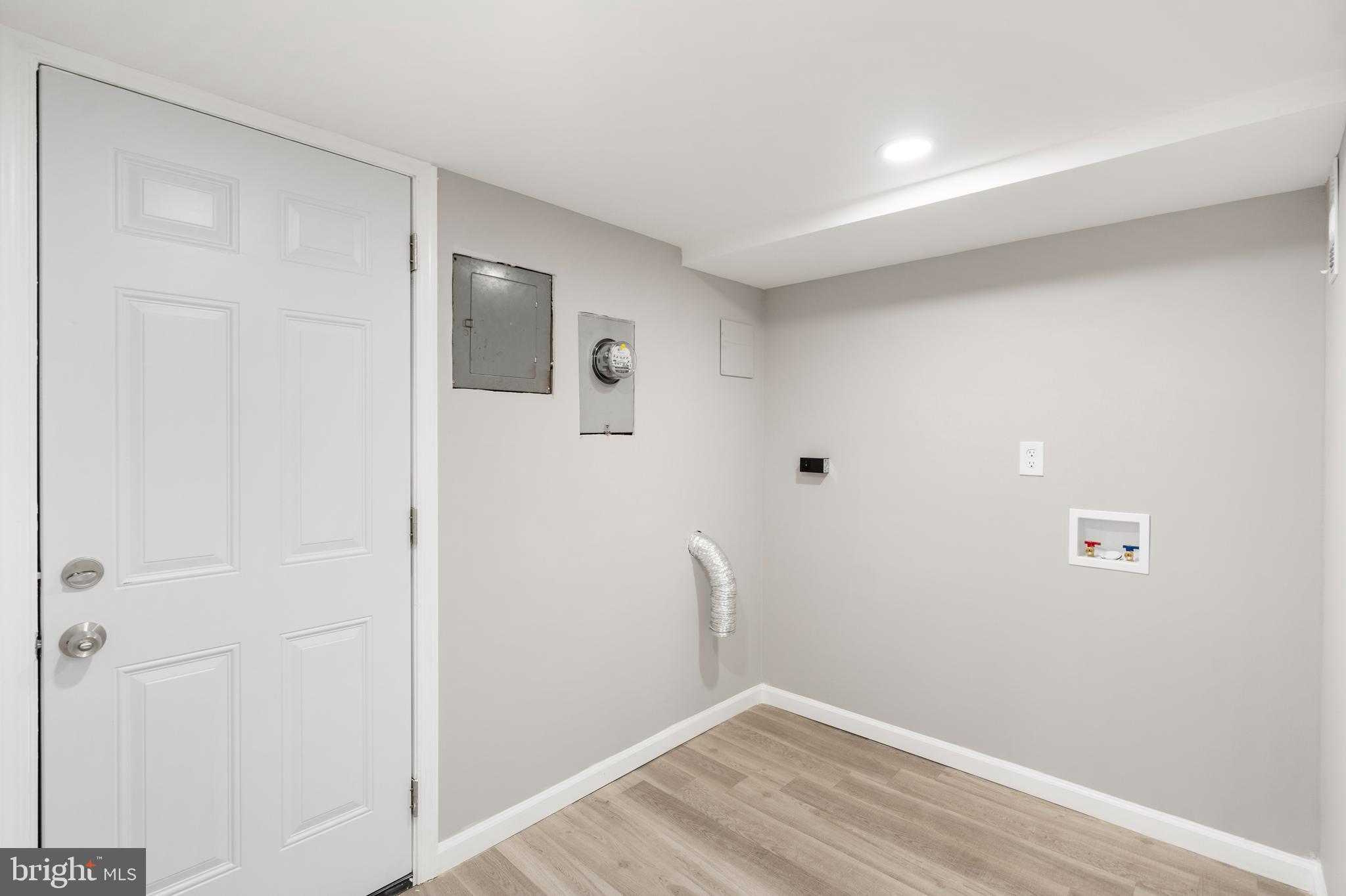 1263 Neighbors Avenue Baltimore, MD 21237 - Photo 26 of 33 a view of small space with wooden floor