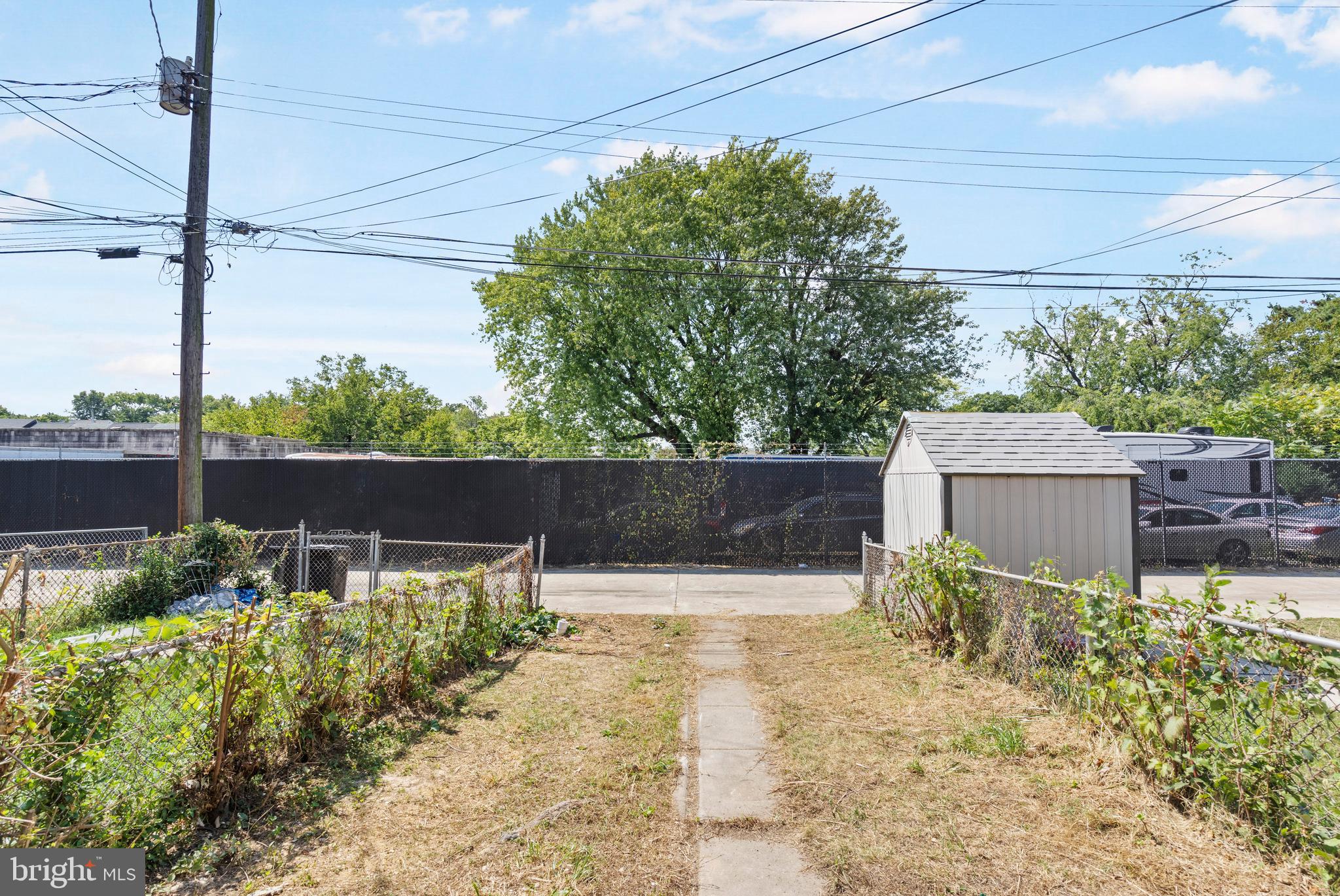 1263 Neighbors Avenue Baltimore, MD 21237 - Photo 30 of 33 a garden view with a seating space