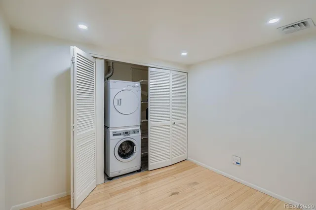 a view of a storage & utility room with washer and dryer