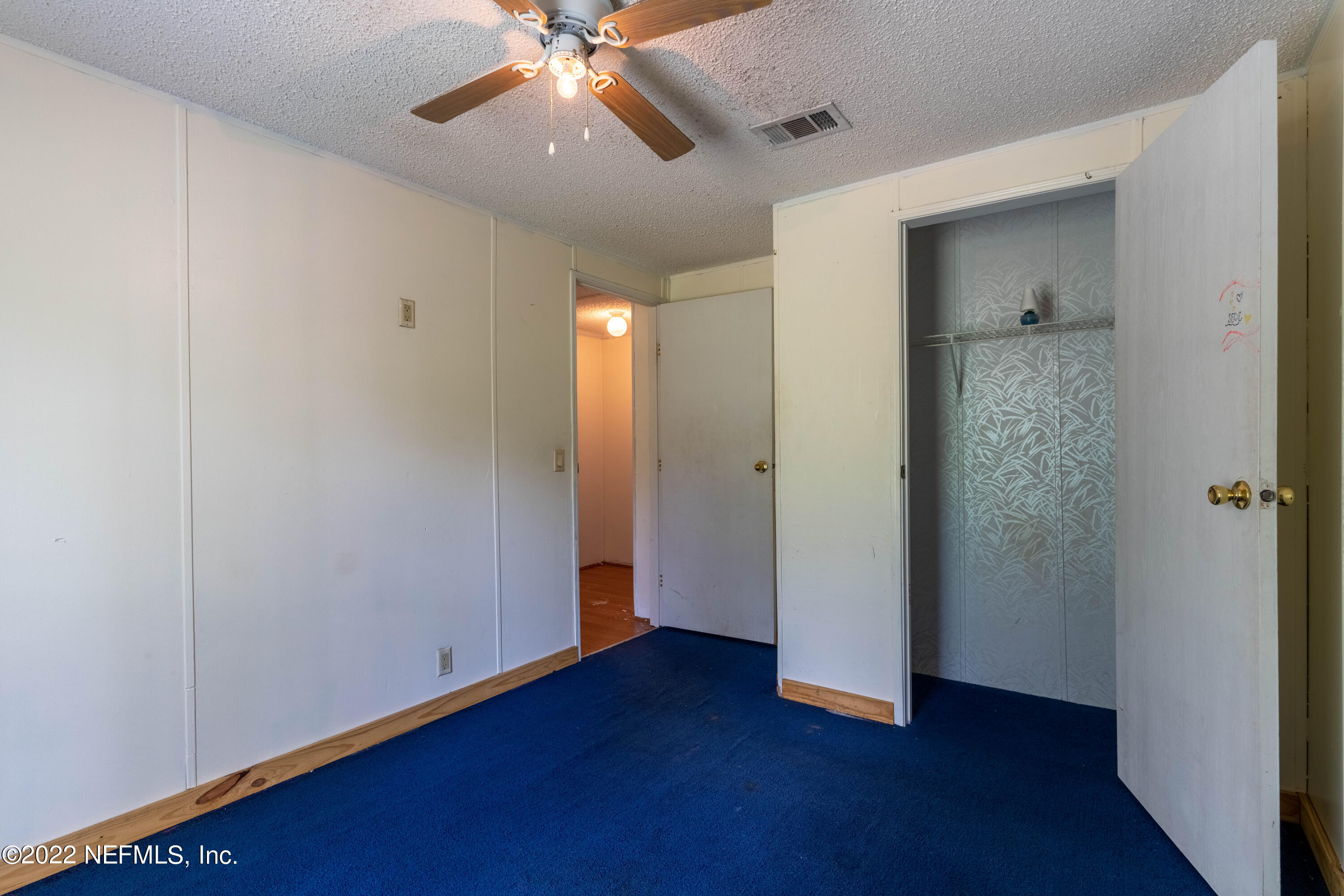 19697 Crews Road Glen St. Mary, FL 32040 - Photo 22 of 25 wooden floor in an empty room