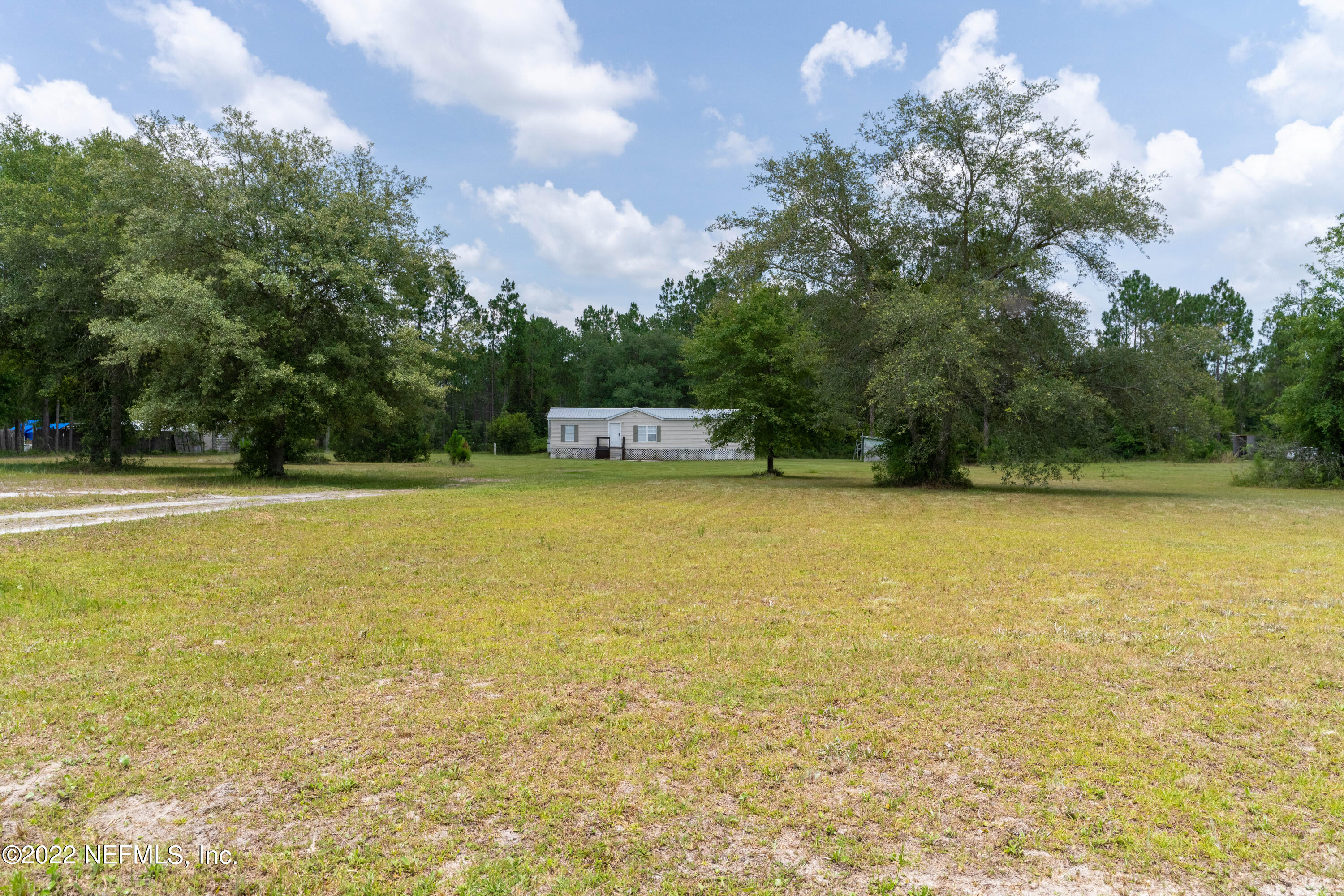 19697 Crews Road Glen St. Mary, FL 32040 - Photo 25 of 25 a view of a swimming pool and an outdoor space