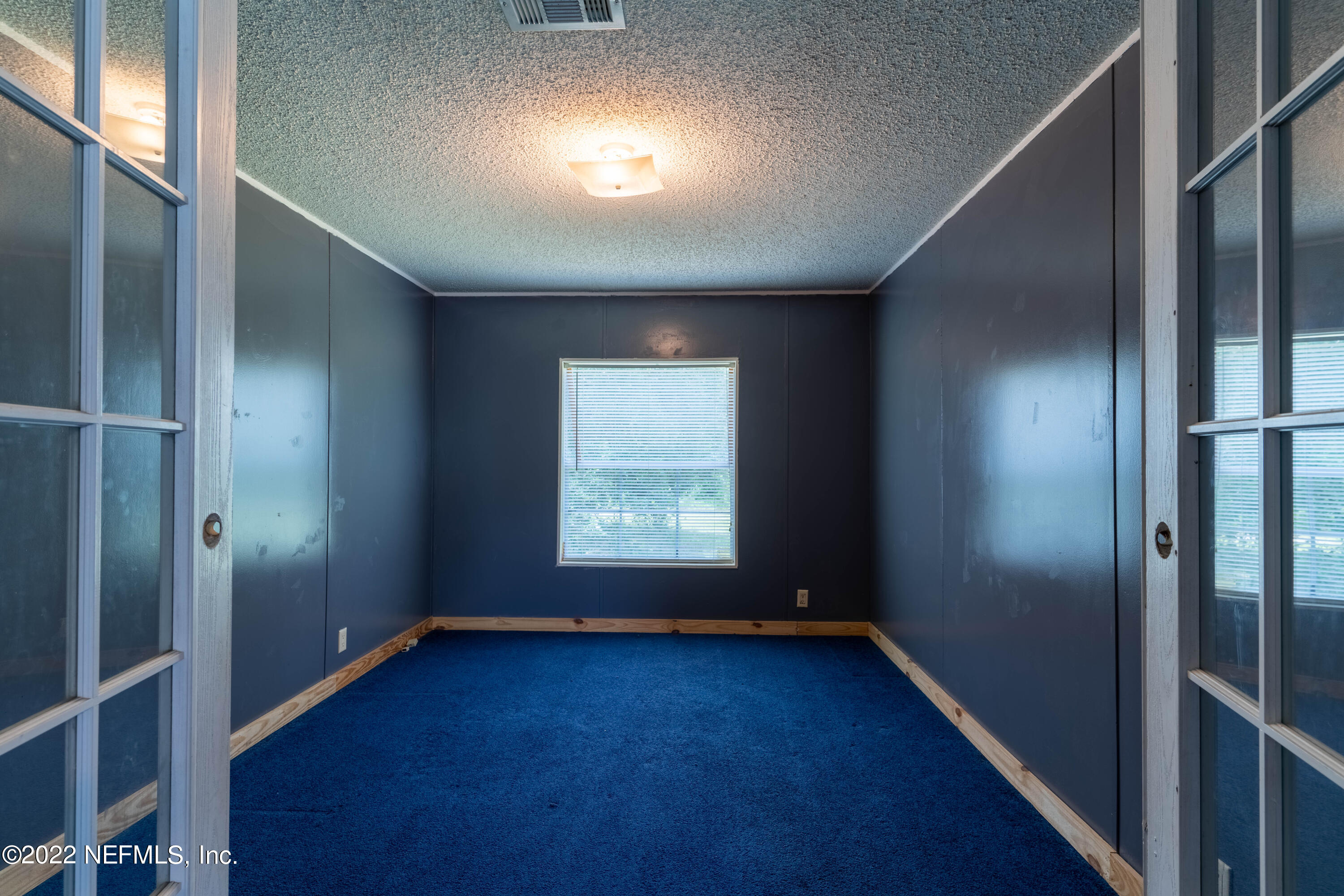 19697 Crews Road Glen St. Mary, FL 32040 - Photo 10 of 25 a view of an empty room with a window