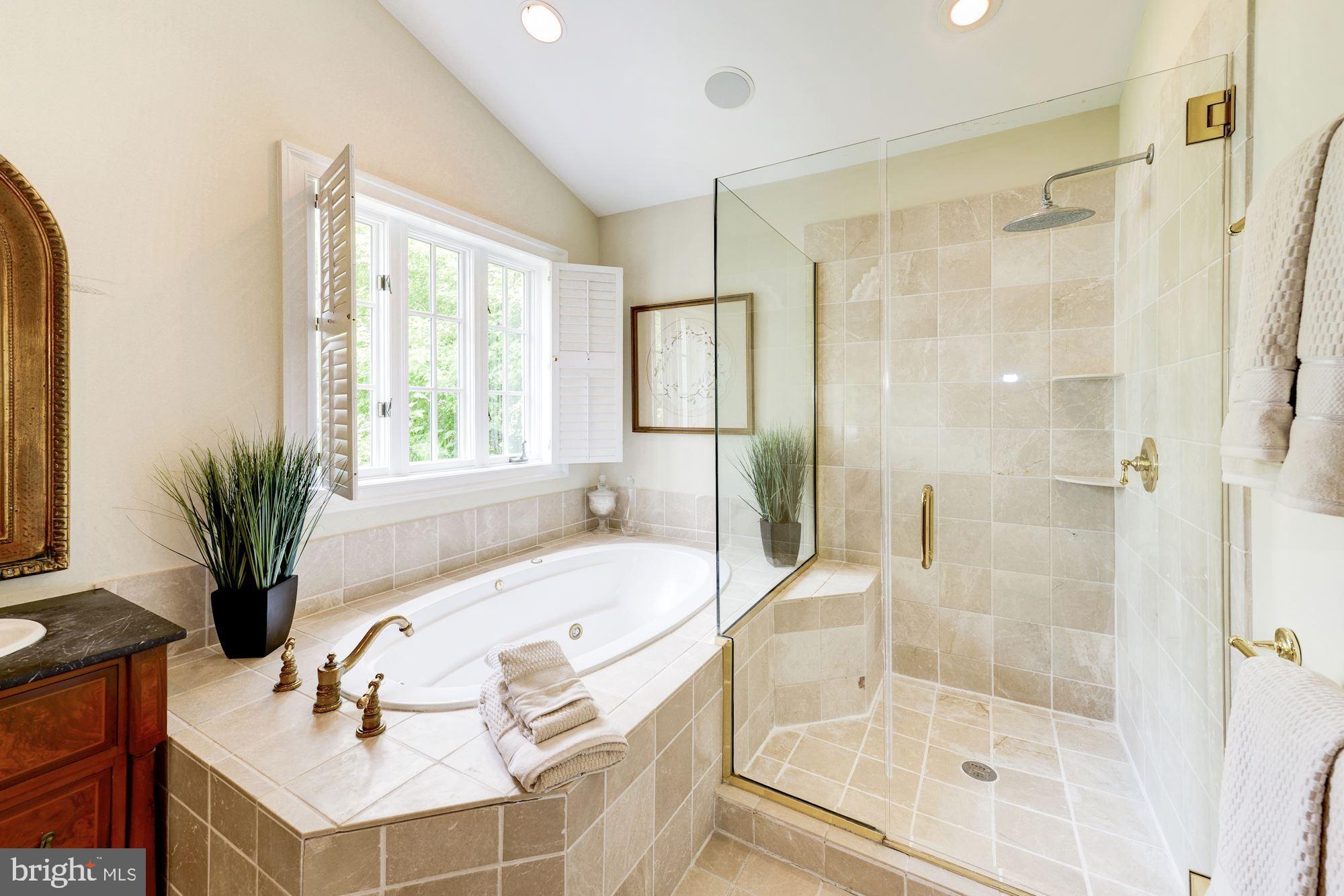 1018 Shipman Lane McLean, VA 22101 - Photo 16 of 30 a bathroom with a tub shower and sink