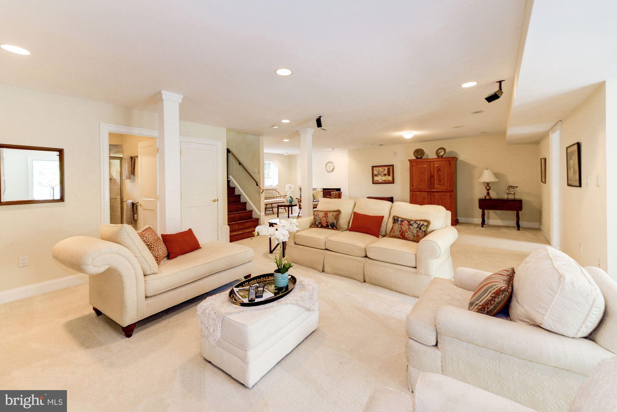 1018 Shipman Lane McLean, VA 22101 - Photo 20 of 30 a living room with furniture kitchen view and a couch