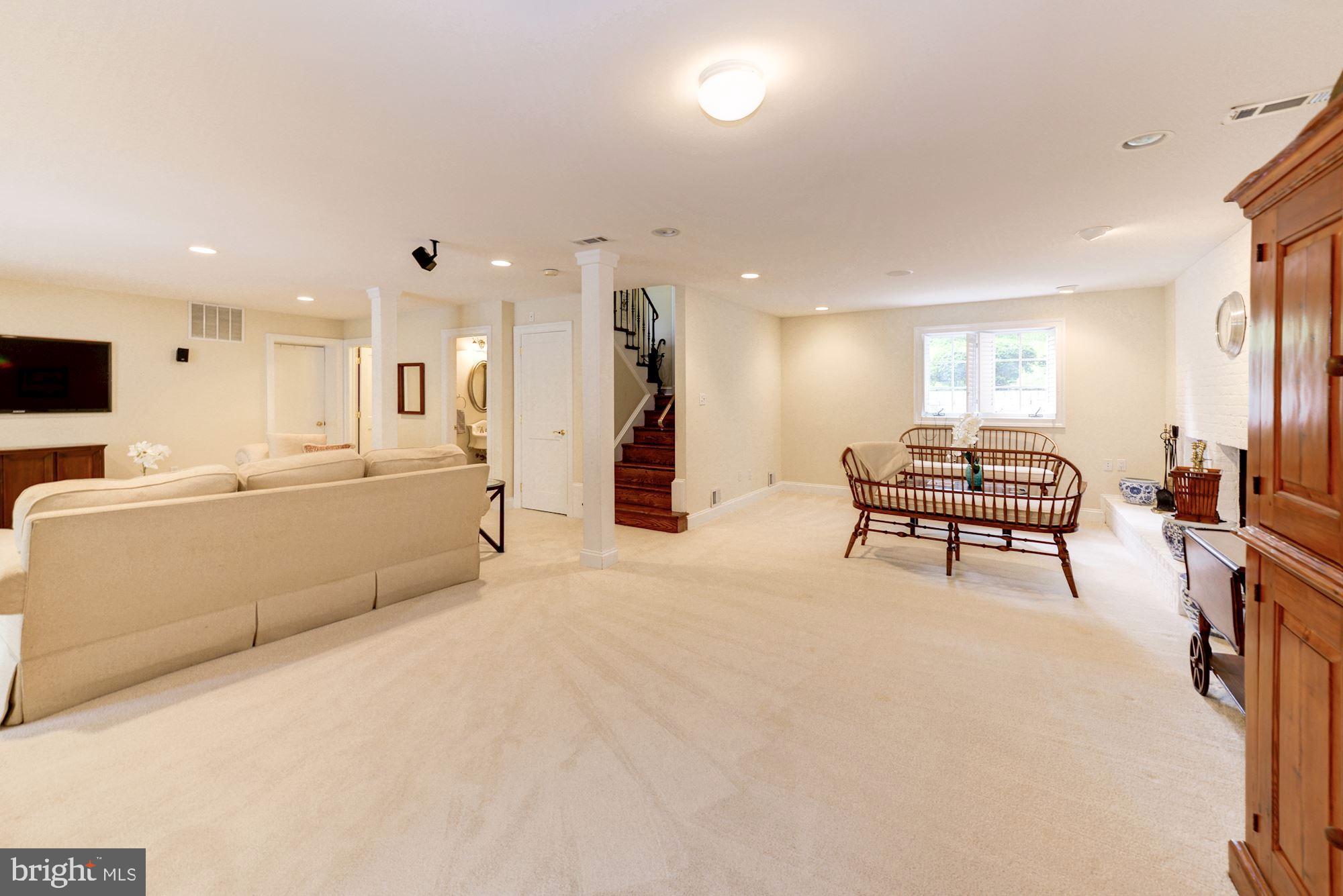 1018 Shipman Lane McLean, VA 22101 - Photo 21 of 30 a living room with furniture and a flat screen tv