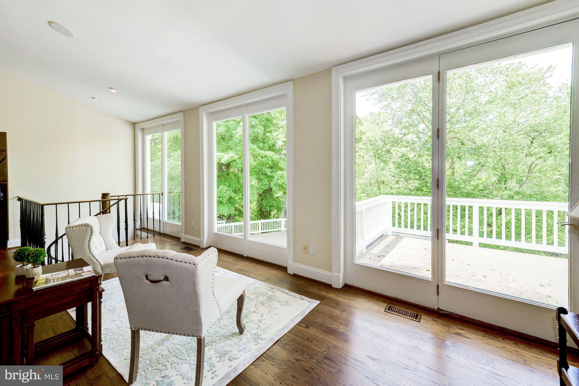 1018 Shipman Lane McLean, VA 22101 - Photo 6 of 30 a view of a room with wooden floor and windows