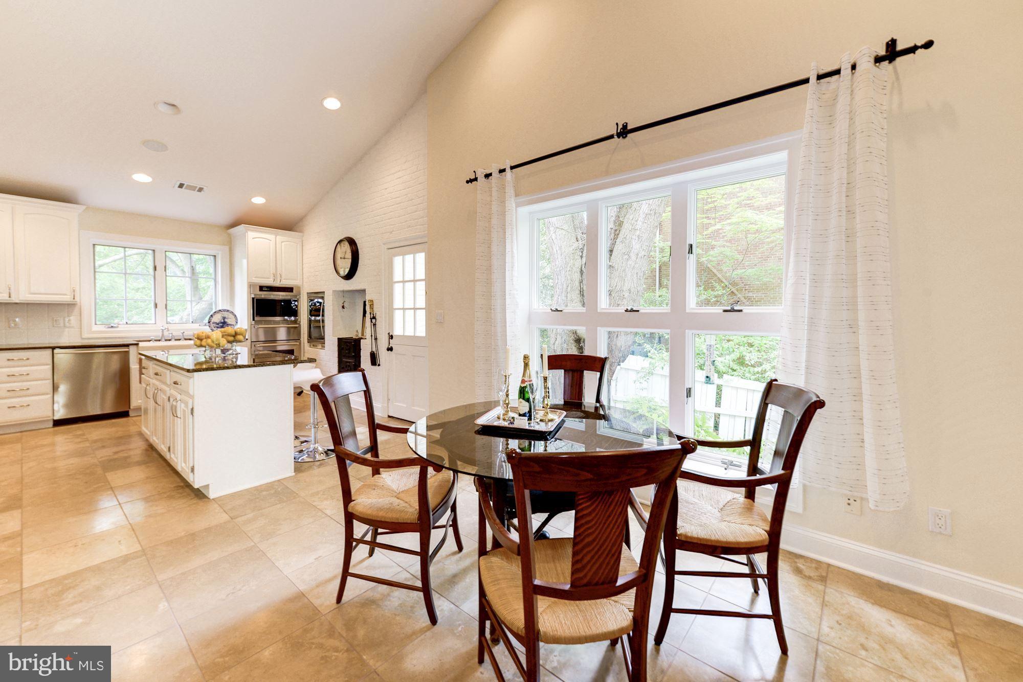 1018 Shipman Lane McLean, VA 22101 - Photo 8 of 30 a view of a dining room with furniture window and outside view
