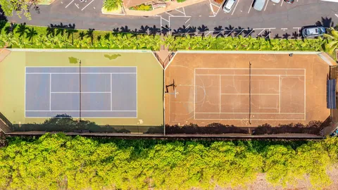 a view of a street with a car parked