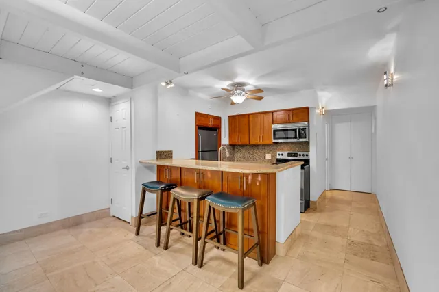 a view of kitchen and dining room