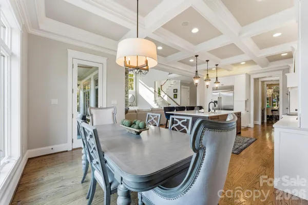 a bed room with a bed and a chair