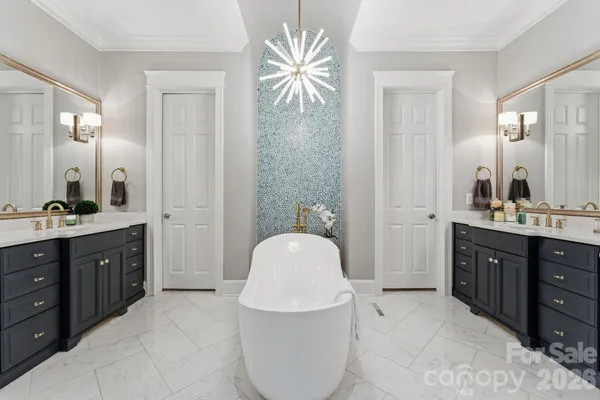 a bed room with a bed and walk in closet