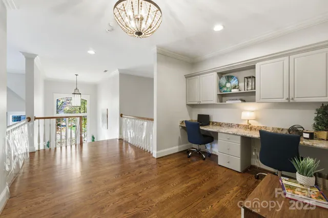 a bedroom with a large bed and a large window