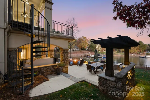 a open kitchen with a stove and a microwave