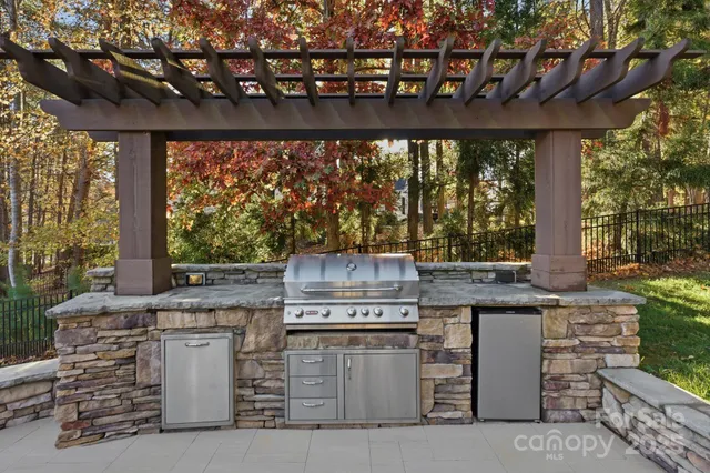 a view of a lake with sitting area