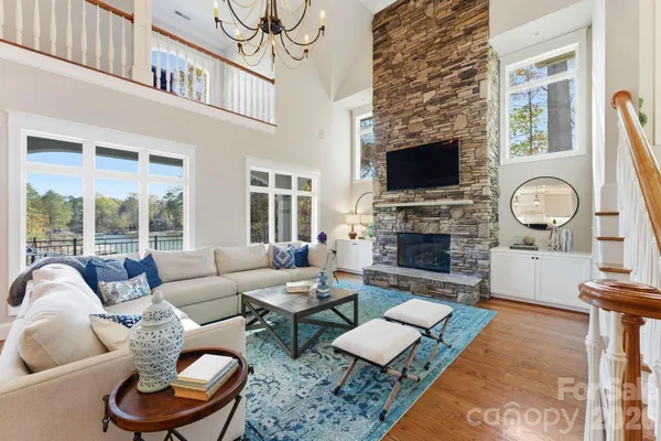 a kitchen with a sink and wooden cabinets