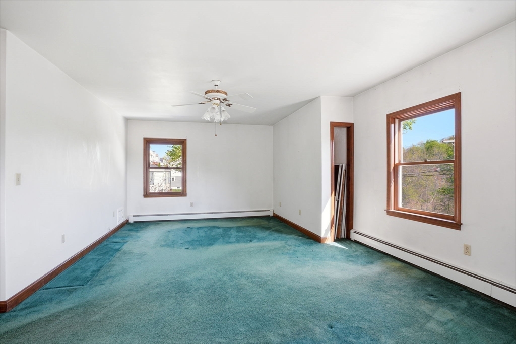 67 Wituwamat Road Weymouth, MA 02191 - Photo 25 of 42 an empty room with windows