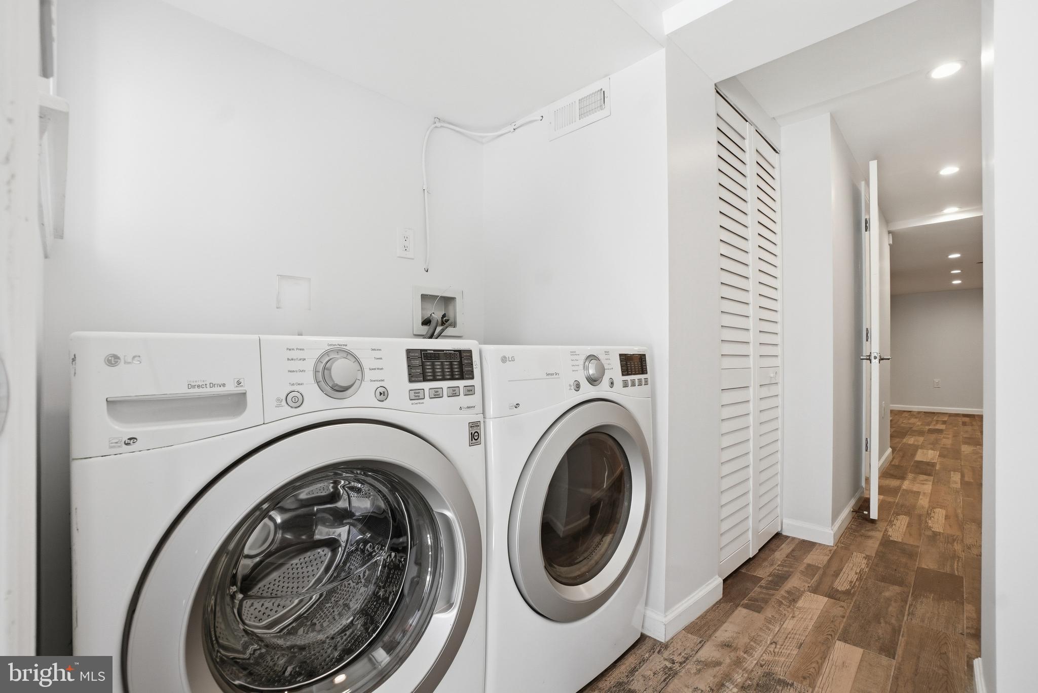 1118 Chicago Street Southeast Washington, DC 20020 - Photo 14 of 27 Modern laundry space with sleek appliances.