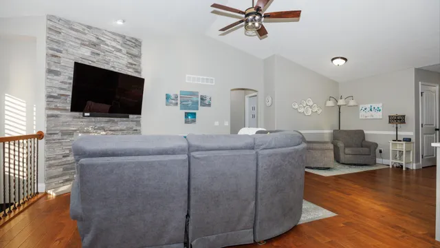 a living room with furniture and a window