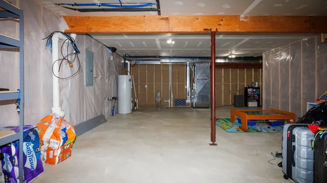 a view of a house with backyard porch and sitting area
